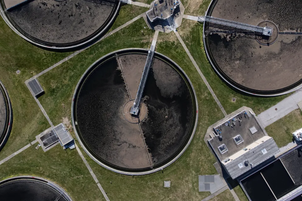 Bird-s eye view of circular retention tanks at water treatment plant